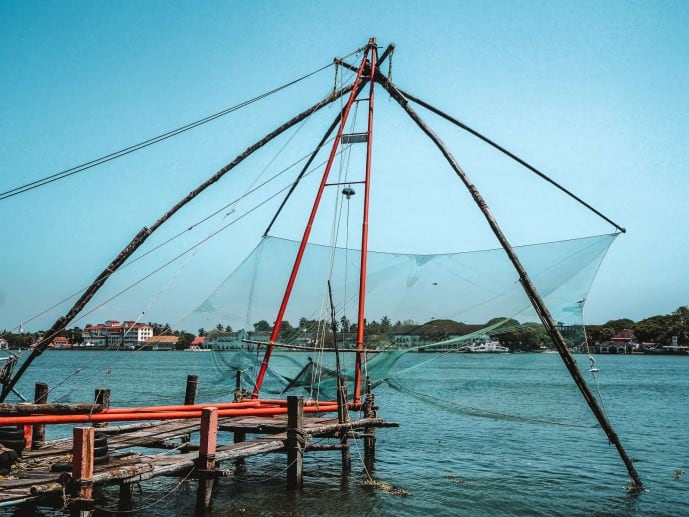 Washing the Fishing Net at Thevara, Cochin, Kerala, India